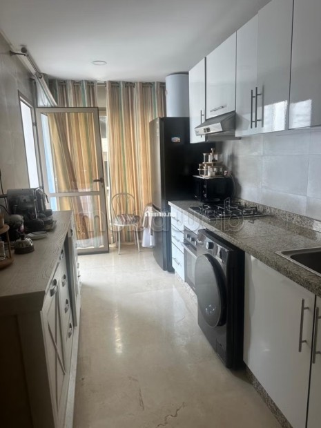 Vente d'un bel appartement en Hassan Centre Ville. 3 belles chambres. Salon traditionnel et système d'antenne parabolique - Vente Immobilier - Rabat - photo 2